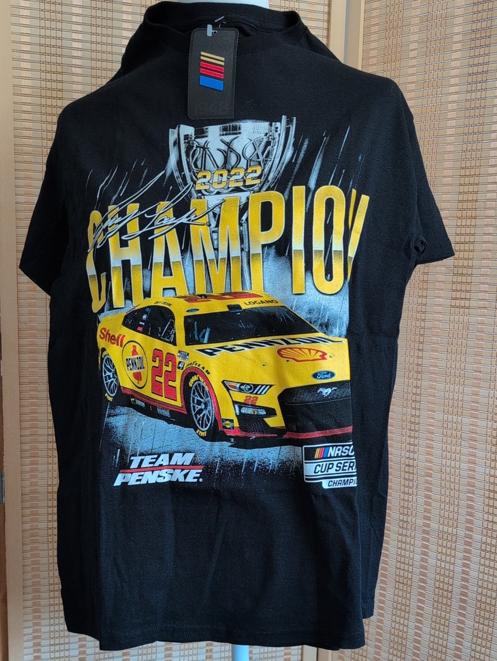 Nascar Black Tee with White Cup Series Emblem and Red/Yellow/Blue Accents 🏁